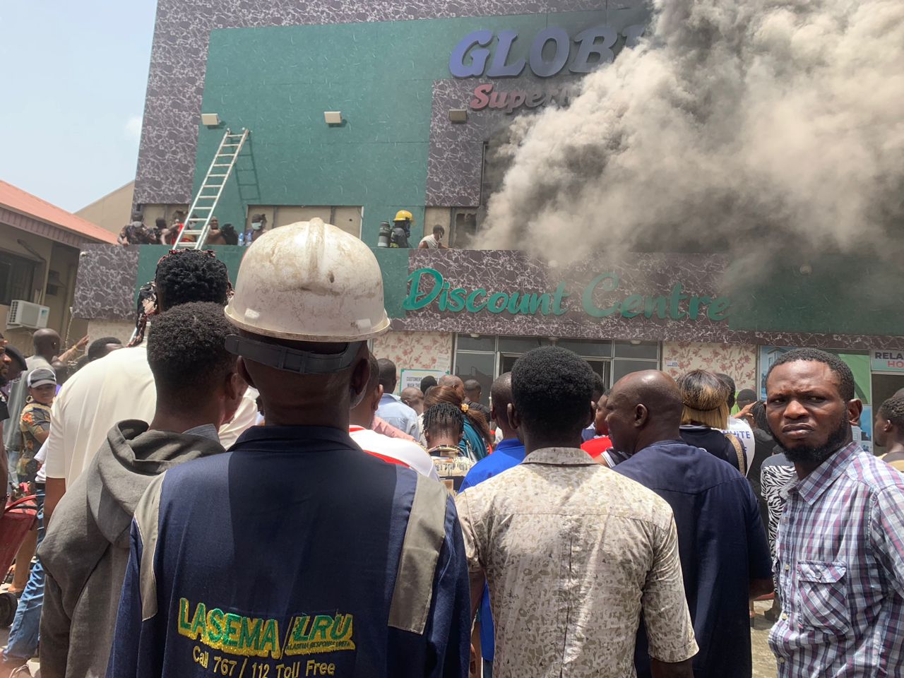 Lady rescued as fire guts Lagos supermarket